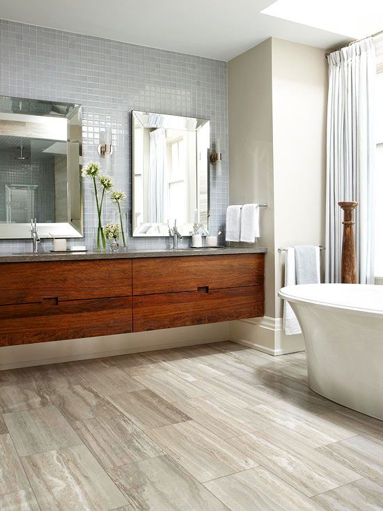 Contemporary Bathroom Design with Wood Floors and Drawers