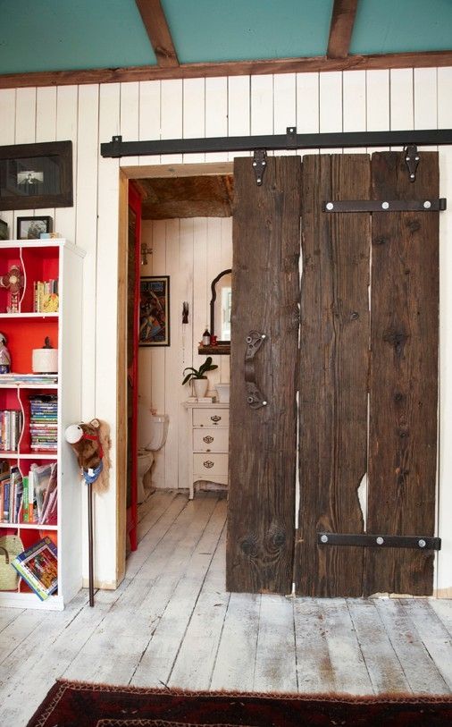 http://homedesignboard.com/wp-content/uploads/2014/08/Reclaimed-Rustic-Wood-Sliding-Bathroom-Door.jpg